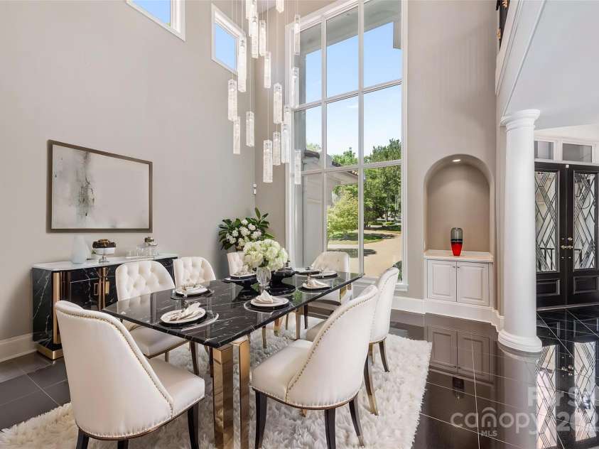 102 Eastham Court, Mooresville, NC 28117.  MLS# CAR4247937, YatesRealty ID 27092. Luxury Dining Room virtually staged