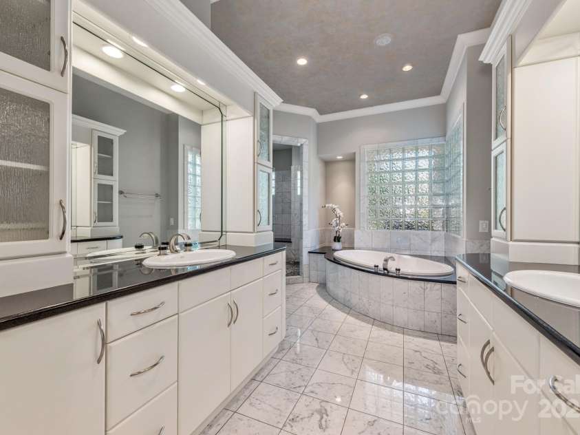 102 Eastham Court, Mooresville, NC 28117.  MLS# CAR4247937, YatesRealty ID 27092. Master Bedroom Ensuite