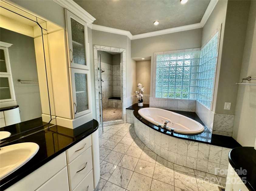 102 Eastham Court, Mooresville, NC 28117.  MLS# CAR4247937, YatesRealty ID 27092. New Shower floor in Primary Bathroom