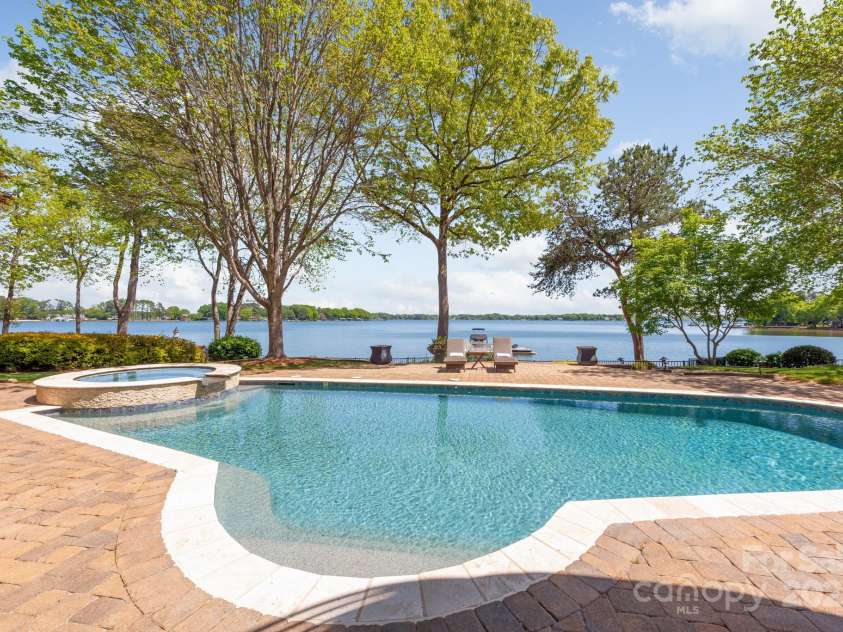 102 Eastham Court, Mooresville, NC 28117.  MLS# CAR4247937, YatesRealty ID 27092. Pool views of lake