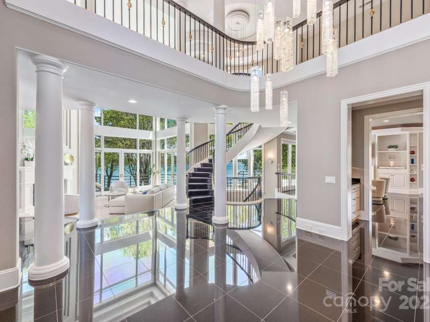 102 Eastham Court, Mooresville, NC 28117.  MLS# CAR4247937, YatesRealty ID 27092. Views of living area from the dining room