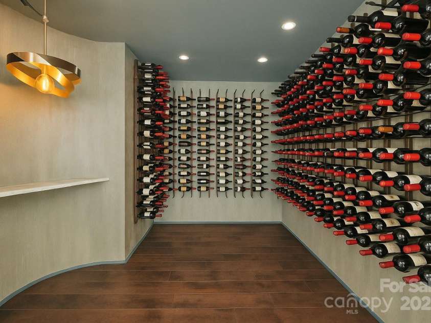 102 Eastham Court, Mooresville, NC 28117.  MLS# CAR4247937, YatesRealty ID 27092. Wine Cellar in walk out basement entertainment space virtually staged