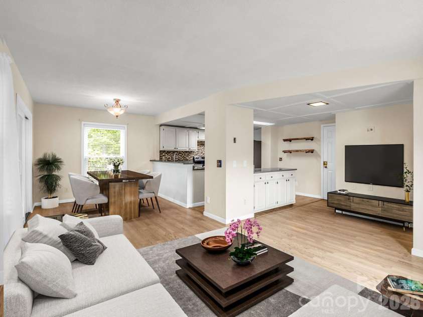 117 Willow Way, Hendersonville, NC 28739.  MLS# CAR4384780, YatesRealty ID 27096. Virtual staging - Open floor plan on main level living, dining and kitchen