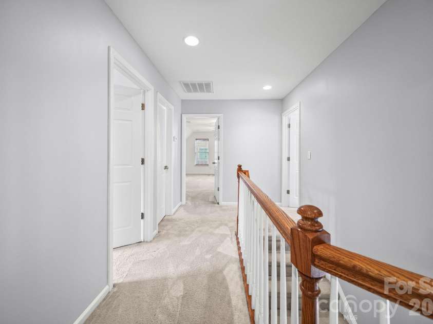 2001 Lake Vista Drive, Mount Holly, NC 28120.  MLS# CAR4363497, YatesRealty ID 27098. 2nd Fl Hallway
