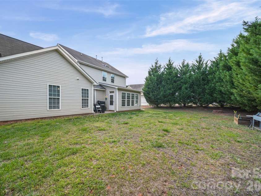 2001 Lake Vista Drive, Mount Holly, NC 28120.  MLS# CAR4363497, YatesRealty ID 27098. Backyard