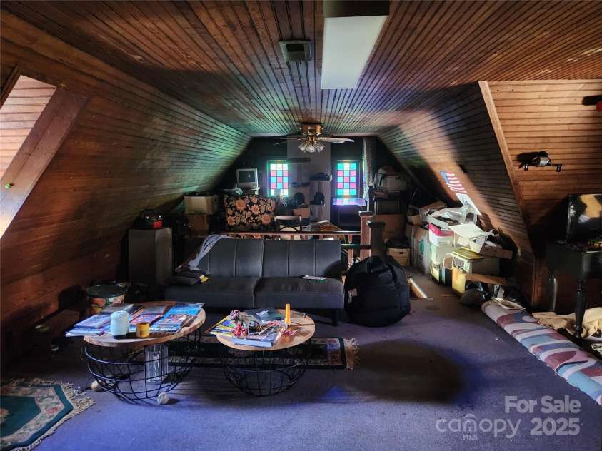 425 Horah Street, Salisbury, NC 28144.  MLS# CAR4267014, YatesRealty ID 27098. 3rd Floor Living Area With Wood Slatted Ceilings/Walls