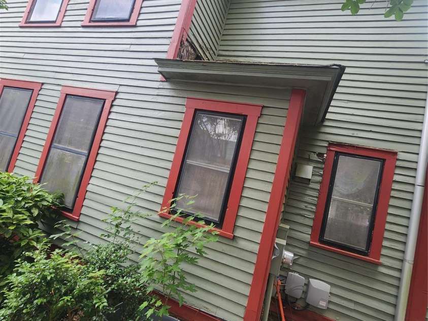 425 Horah Street, Salisbury, NC 28144.  MLS# CAR4267014, YatesRealty ID 27098. Wood Siding Missing and Leaking Into Bar Area