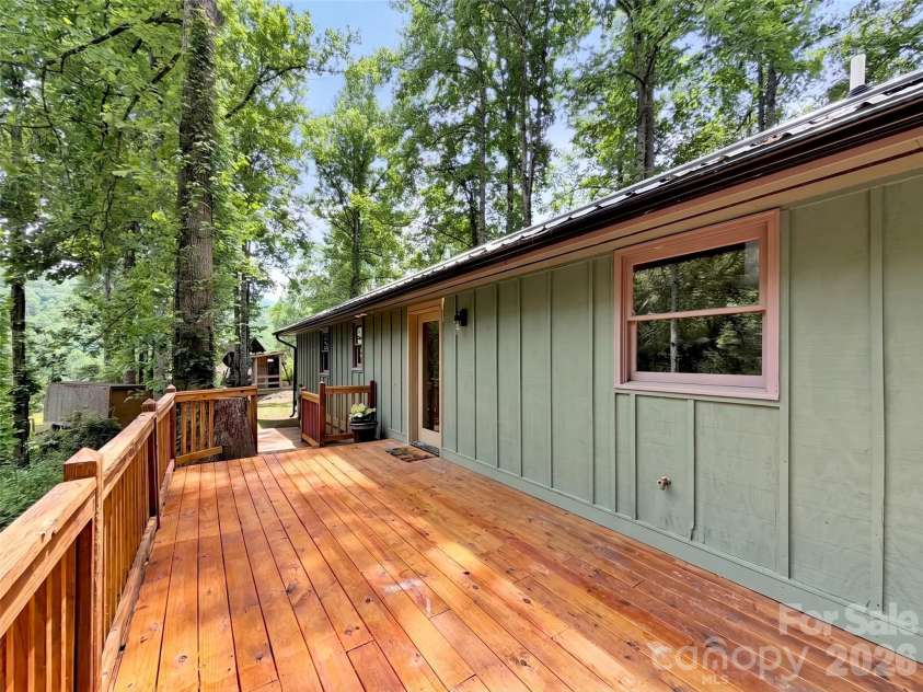 148 Cross Stitch Mountain Road, Sylva, NC 28779.  MLS# CAR4388302, YatesRealty ID 27099. Back deck