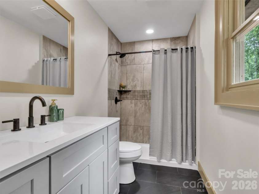 148 Cross Stitch Mountain Road, Sylva, NC 28779.  MLS# CAR4388302, YatesRealty ID 27099. Ensuite full bath