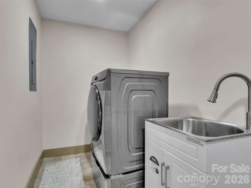 148 Cross Stitch Mountain Road, Sylva, NC 28779.  MLS# CAR4388302, YatesRealty ID 27099. Laundry room - off main primary