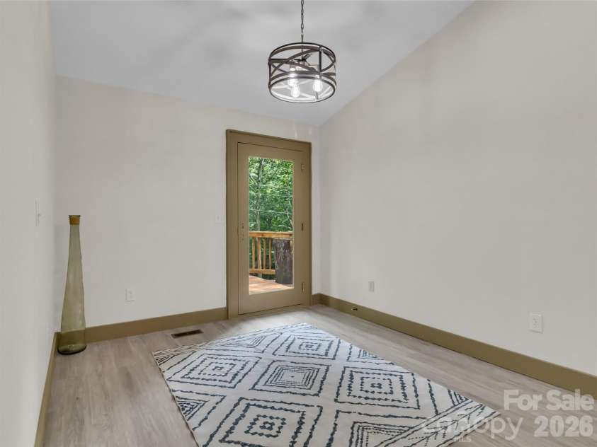 148 Cross Stitch Mountain Road, Sylva, NC 28779.  MLS# CAR4388302, YatesRealty ID 27099. Potential dining area