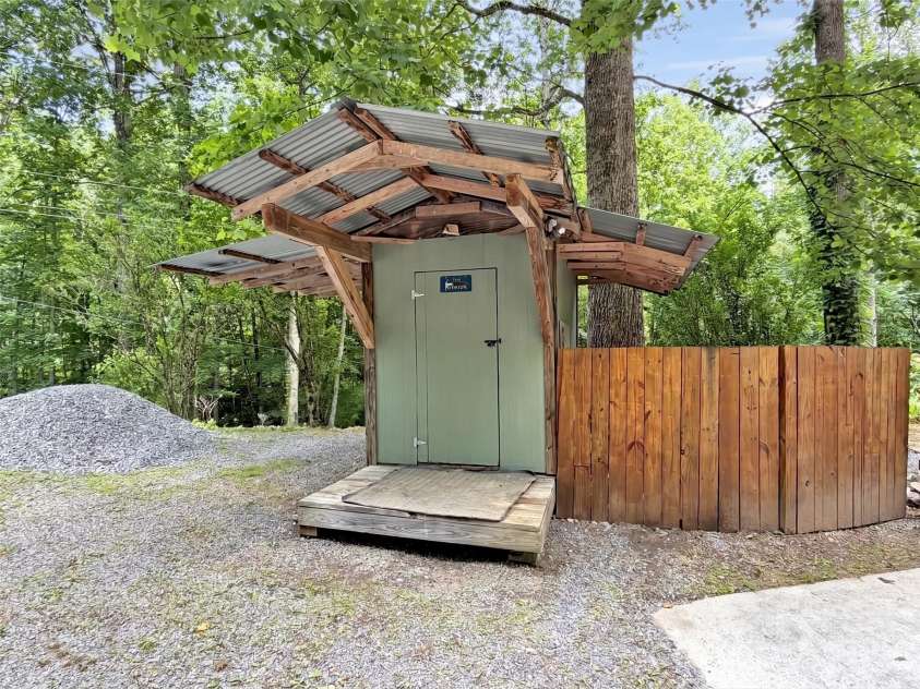 148 Cross Stitch Mountain Road, Sylva, NC 28779.  MLS# CAR4388302, YatesRealty ID 27099. Storage shed