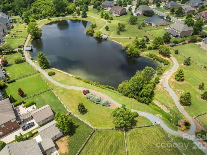 4004 Clover Hill Road, Indian Trail, NC 28079.  MLS# CAR4281996, YatesRealty ID 27101. 2 acre pond