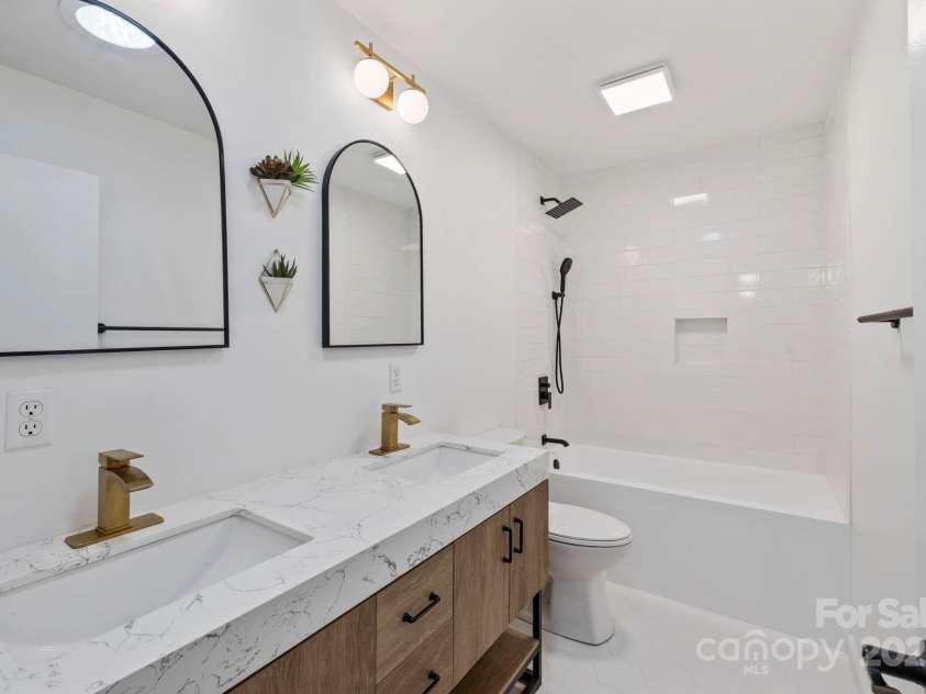 19 Golden Oaks Lane, Fletcher, NC 28732.  MLS# CAR4279372, YatesRealty ID 27110. Stunningly updated bath