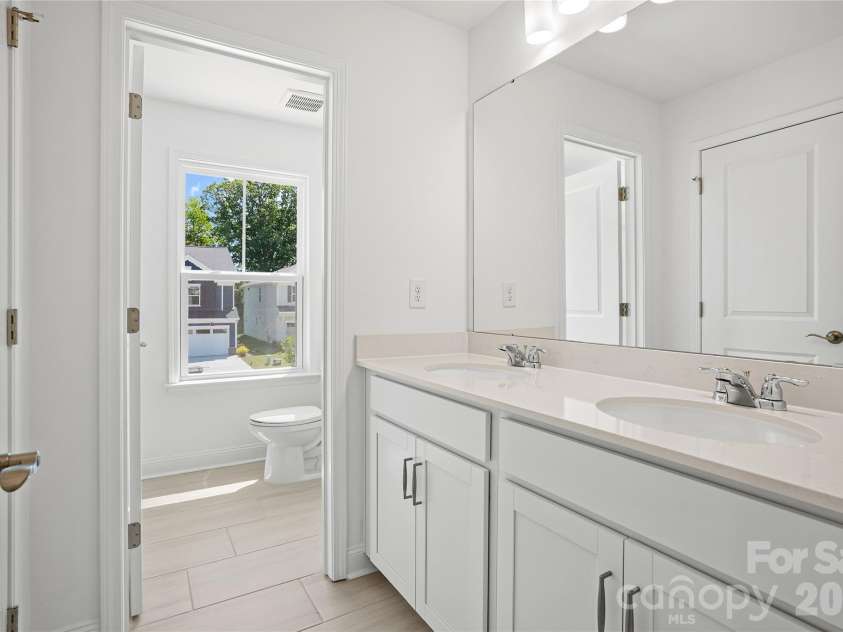 1023 WT Ferguson Drive, Matthews, NC 28104.  MLS# CAR4323226, YatesRealty ID 27111. 