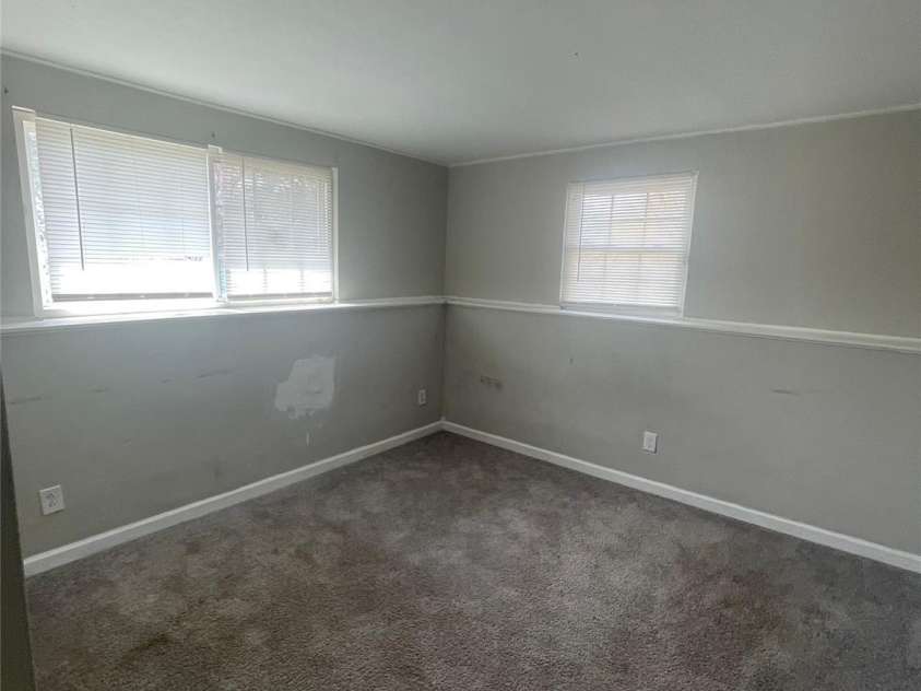 1221 Farmfield Lane, Charlotte, NC 28213.  MLS# CAR4351416, YatesRealty ID 27115. Downstairs bedroom