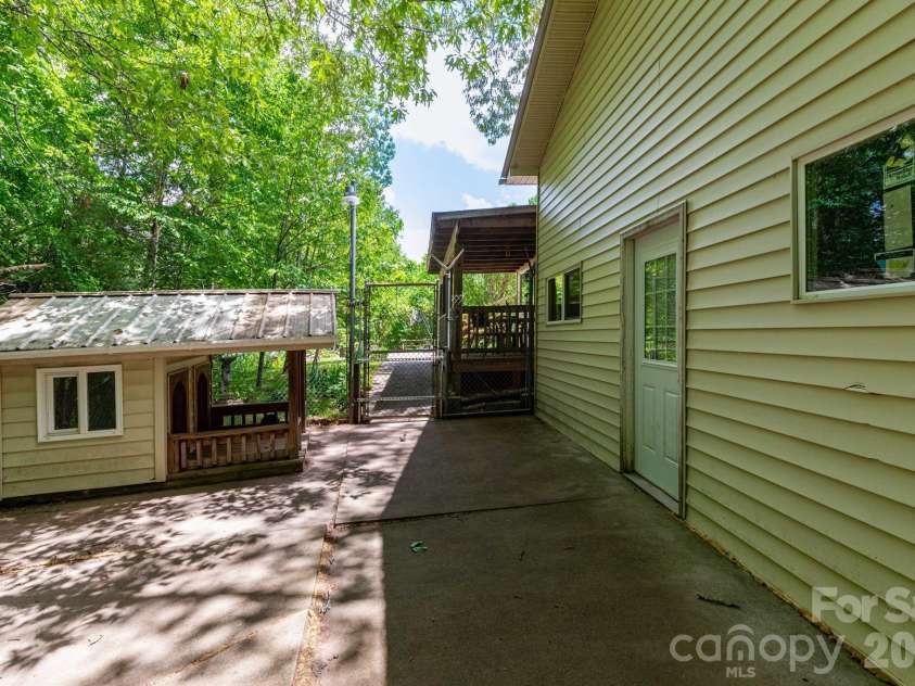 45 and 54 Forsythe Lane, Waynesville, NC 28785.  MLS# CAR4386797, YatesRealty ID 27116. Dog lot plus kennel