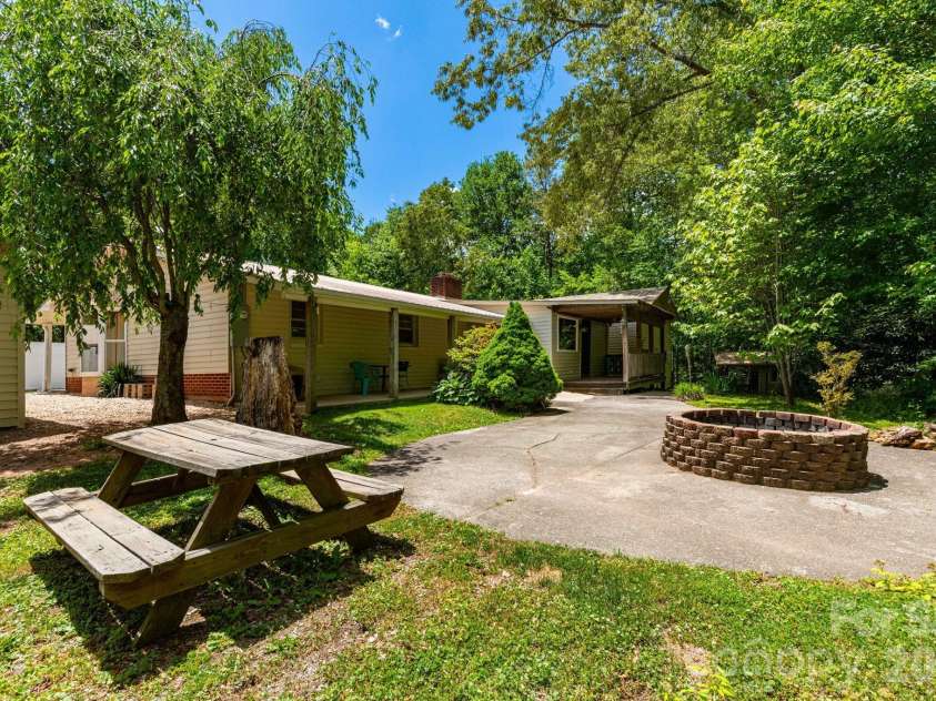 45 and 54 Forsythe Lane, Waynesville, NC 28785.  MLS# CAR4386797, YatesRealty ID 27116. Firepit area
