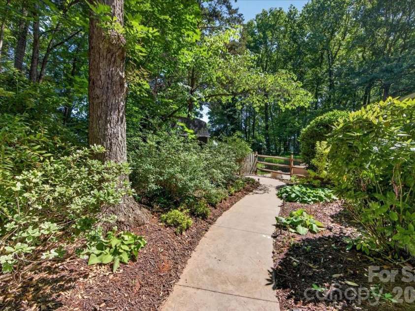 3816 Smokerise Hill Drive, Charlotte, NC 28277.  MLS# CAR4384889, YatesRealty ID 27117. Side walkway to backyard 