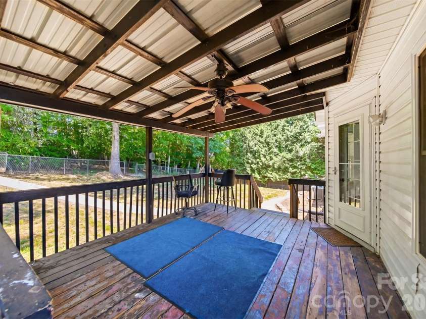 107 Cliffwood Drive, Hudson, NC 28638.  MLS# CAR4384762, YatesRealty ID 27118. Covered deck has steps from both sides.