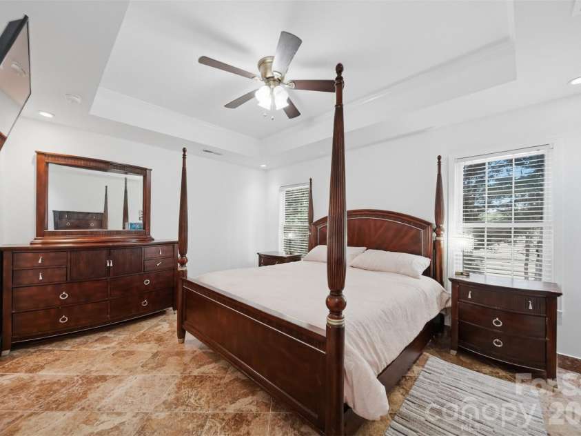 107 Cliffwood Drive, Hudson, NC 28638.  MLS# CAR4384762, YatesRealty ID 27118. Primary bedroom has plenty of room for a king sized bed! Tray ceiling and ceiling fan.