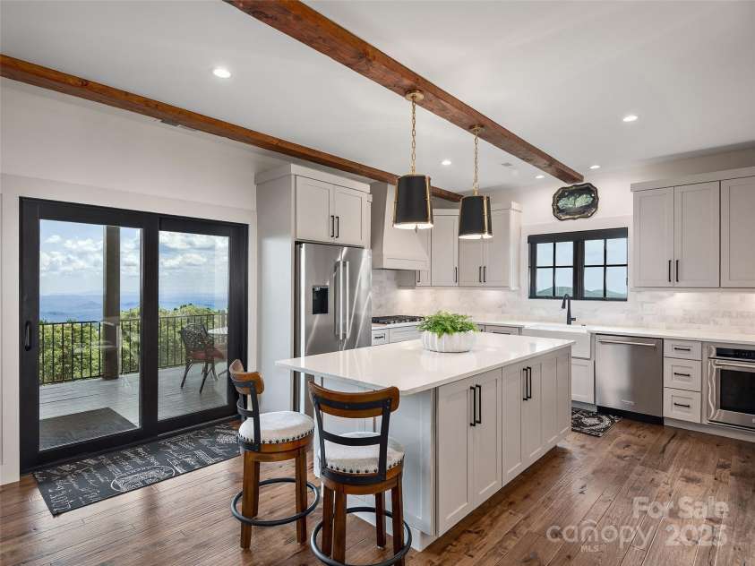 332 Summerset Drive, Hendersonville, NC 28792.  MLS# CAR4275033, YatesRealty ID 27124. Modern Milky White Really Sets Off The Blues and Greens of the Mountains