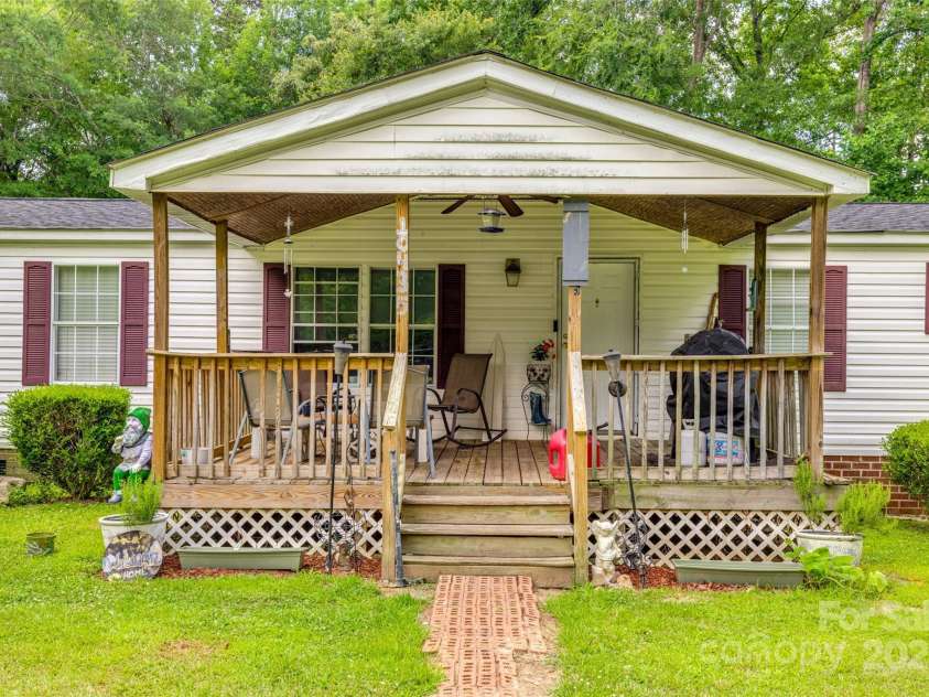 10435 Silver Mine Road, Fort Mill, SC 29707.  MLS# CAR4275041, YatesRealty ID 27125. RELAX ON THE FRONT COVERED DECK