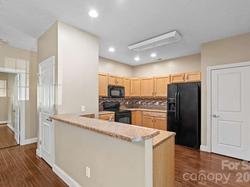 68 Fox Briar Drive, Fletcher, NC 28732.  MLS# CAR4322549, YatesRealty ID 2713. Kitchen with breakfast bar