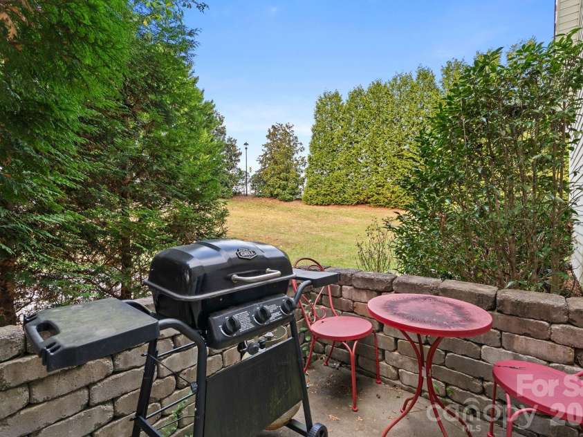 68 Fox Briar Drive, Fletcher, NC 28732.  MLS# CAR4322549, YatesRealty ID 2713. Private patio for grilling and relaxing