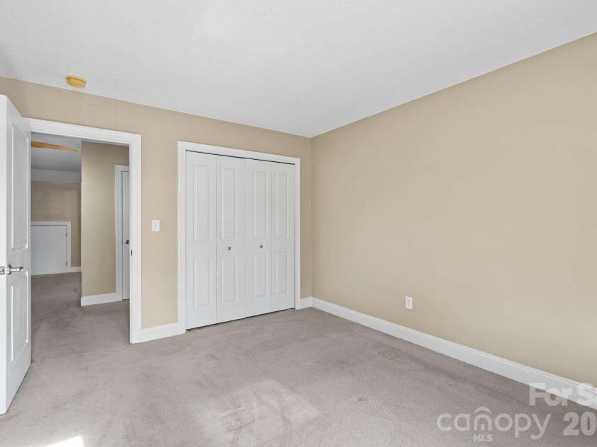 68 Fox Briar Drive, Fletcher, NC 28732.  MLS# CAR4322549, YatesRealty ID 2713. Third bedroom closet