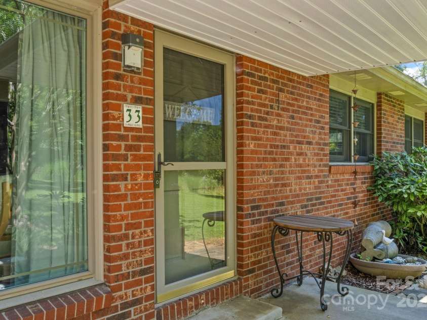33 & 34 Grandview Court, Asheville, NC 28806.  MLS# CAR4277242, YatesRealty ID 27132. Covered Patio - 33 Grandview