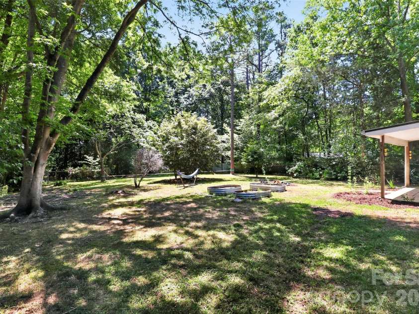 5112 Split Oak Drive, Charlotte, NC 28227.  MLS# CAR4383159, YatesRealty ID 27133. HUGE backyard