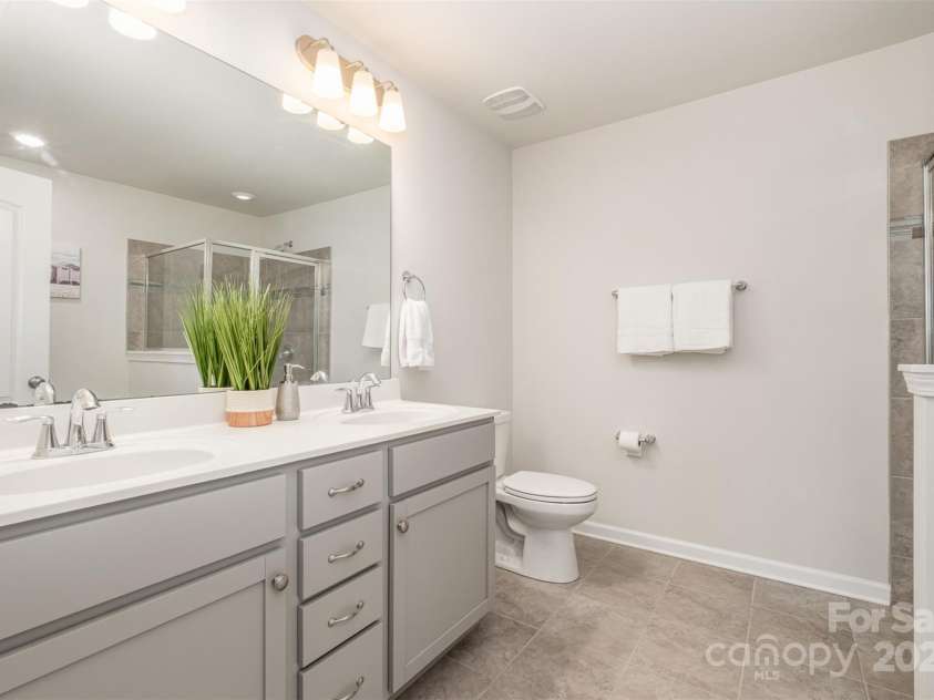 3436 Scottish Fern Lane, Indian Land, SC 29707.  MLS# CAR4259676, YatesRealty ID 27142. Owner's bath with dual vanities, shower and soaking tub