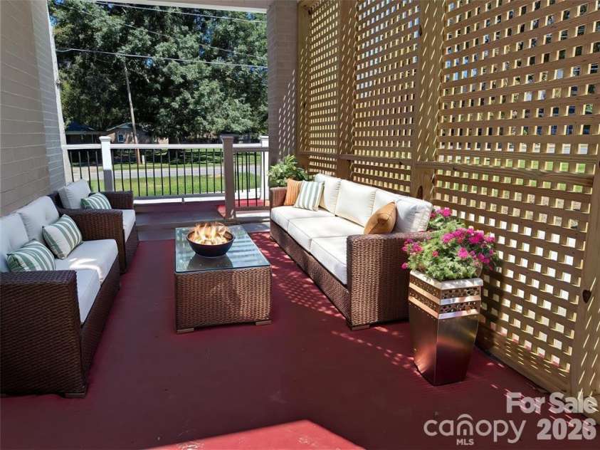 933 Warren Street, Shelby, NC 28150.  MLS# CAR4377688, YatesRealty ID 27144. Virtually staged Front porch. with lattice for shade.