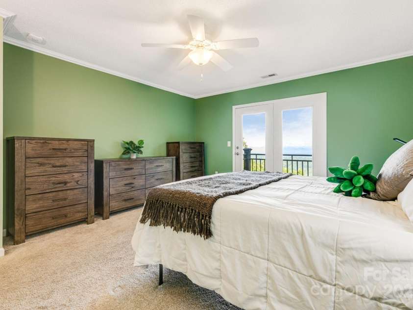 201 Cedar Mountain Road, Asheville, NC 28803.  MLS# CAR4281468, YatesRealty ID 27145. Amazing long range views from Primary bedroom