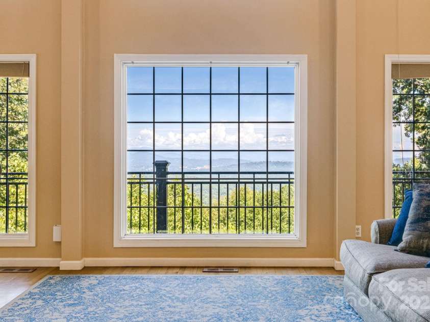 201 Cedar Mountain Road, Asheville, NC 28803.  MLS# CAR4281468, YatesRealty ID 27145. Amazing long range views in the living room