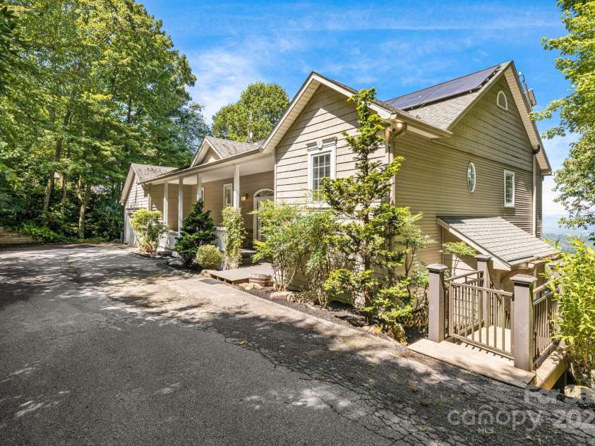 201 Cedar Mountain Road, Asheville, NC 28803.  MLS# CAR4281468, YatesRealty ID 27145. Plenty of parking stairs to wrap around deck, right side