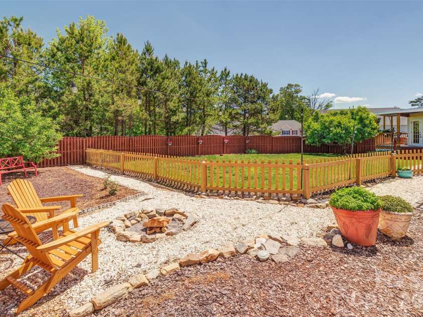 7 Breyerton Court, Asheville, NC 28804.  MLS# CAR4380196, YatesRealty ID 27146. Fire pit