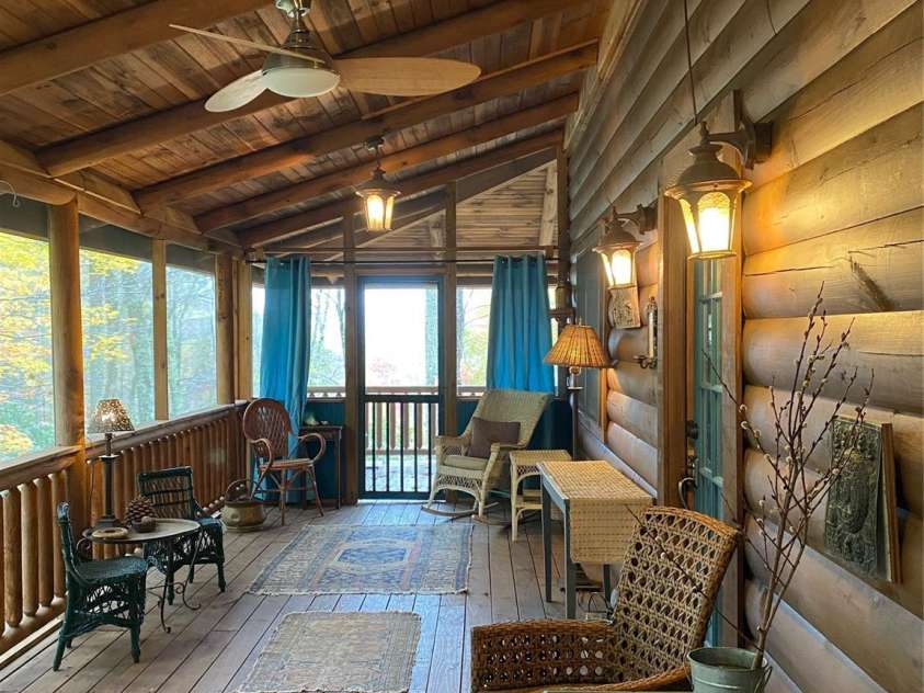 102 Carriage Drive, Fairview, NC 28730.  MLS# CAR4379033, YatesRealty ID 27149. Delightful, Spacious Screened Porch.