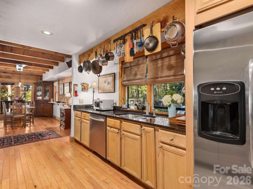 102 Carriage Drive, Fairview, NC 28730.  MLS# CAR4379033, YatesRealty ID 27149. Enjoy Views From Kitchen Window And Convenient Connection Between Kitchen & Dining Area