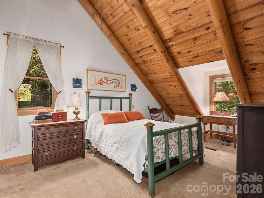 102 Carriage Drive, Fairview, NC 28730.  MLS# CAR4379033, YatesRealty ID 27149. Upper Level Bedroom With Lofted Ceilings And Beautiful Natural Light
