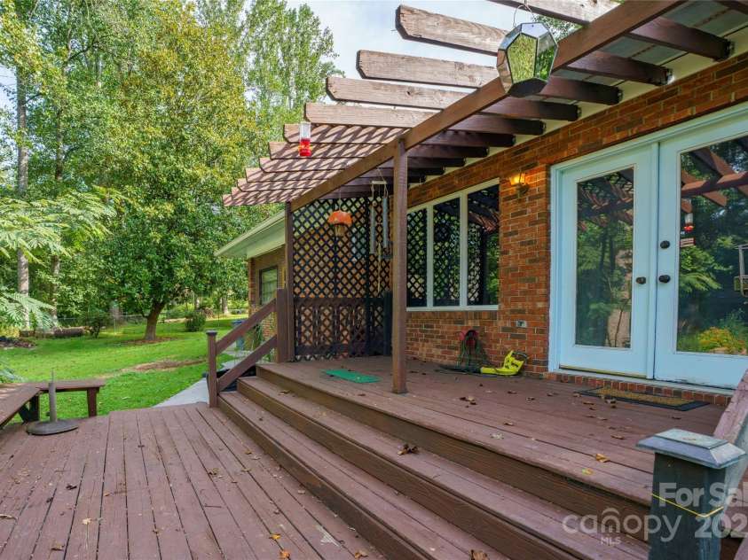 335 Lake Circle Drive, Hendersonville, NC 28792.  MLS# CAR4295963, YatesRealty ID 2715. Back deck