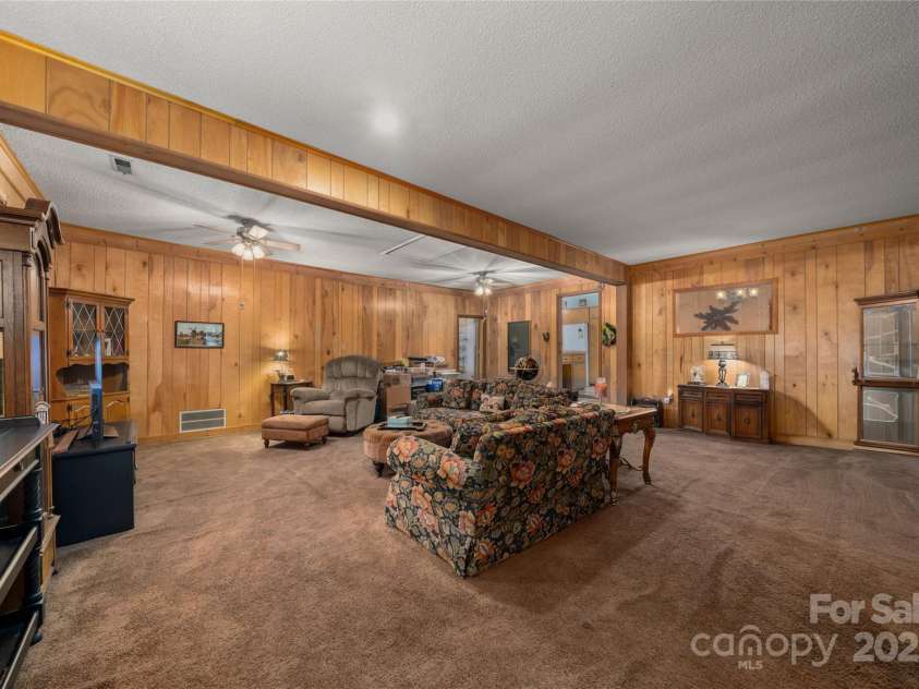 335 Lake Circle Drive, Hendersonville, NC 28792.  MLS# CAR4295963, YatesRealty ID 2715. Family room