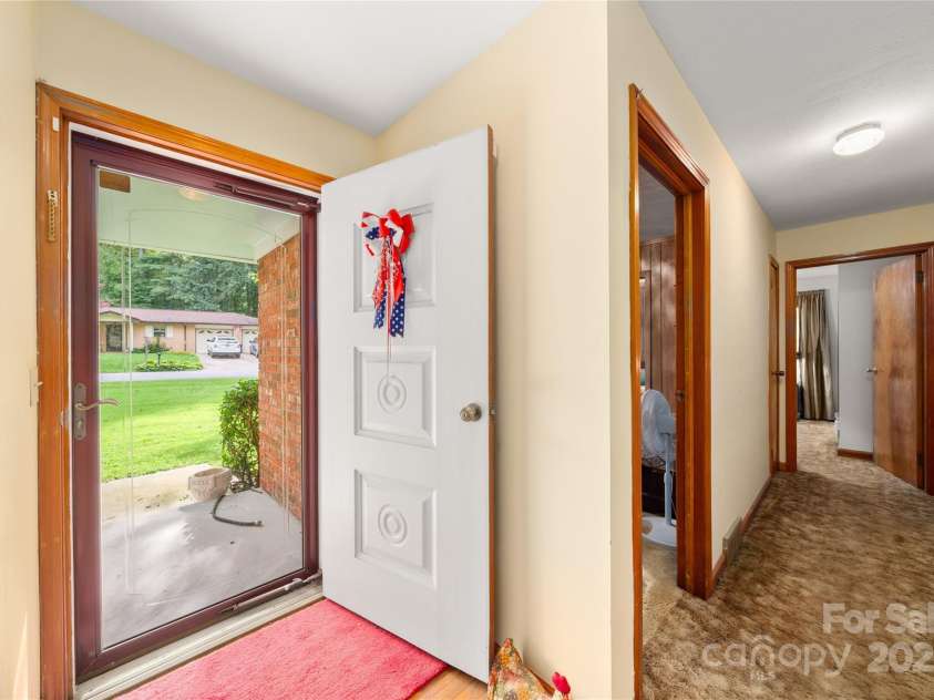 335 Lake Circle Drive, Hendersonville, NC 28792.  MLS# CAR4295963, YatesRealty ID 2715. Front entrance