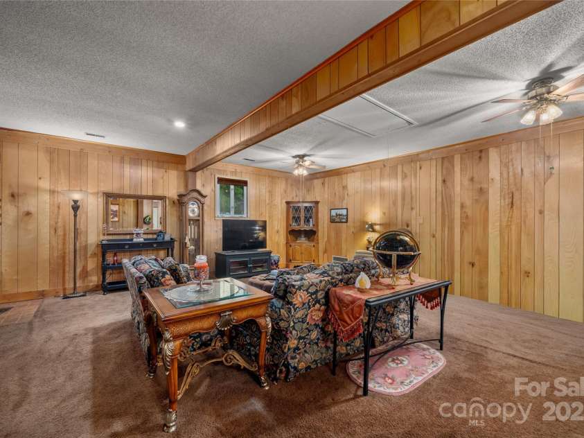 335 Lake Circle Drive, Hendersonville, NC 28792.  MLS# CAR4295963, YatesRealty ID 2715. Large family room