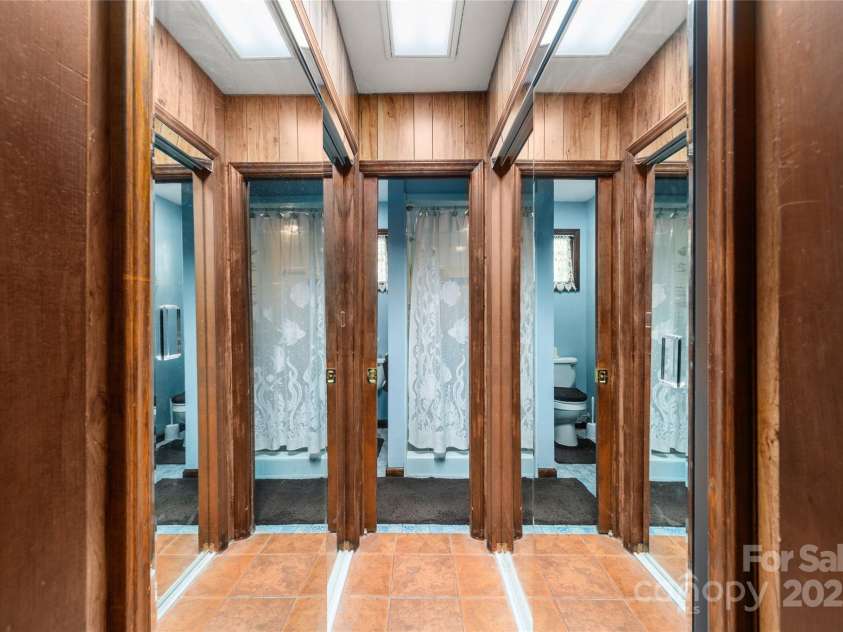 335 Lake Circle Drive, Hendersonville, NC 28792.  MLS# CAR4295963, YatesRealty ID 2715. Mirrored closets 