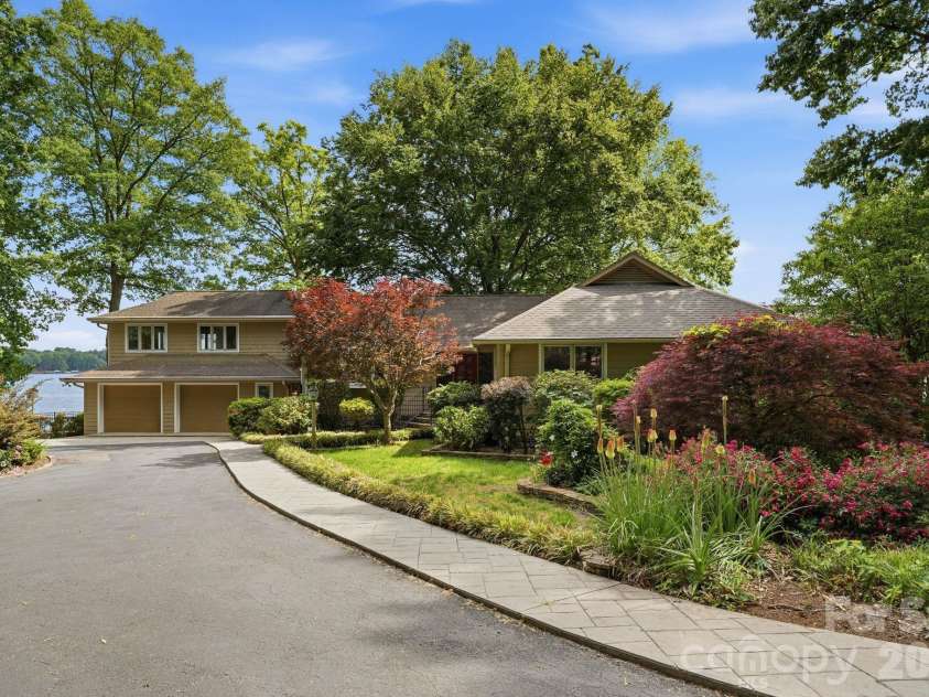 3725 Kingfisher Lane, Terrell, NC 28682.  MLS# CAR4375758, YatesRealty ID 27150. Circular driveway with mature landscaping