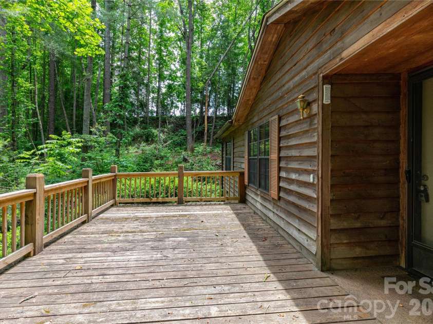 1010 Sharon Ridge Road, Fairview, NC 28730.  MLS# CAR4379788, YatesRealty ID 27153. Expansive front deck