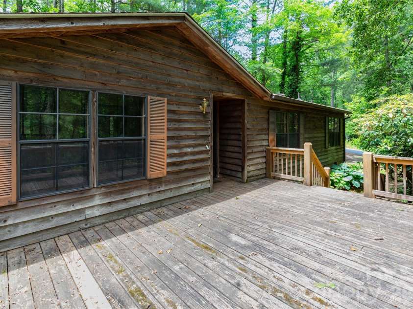 1010 Sharon Ridge Road, Fairview, NC 28730.  MLS# CAR4379788, YatesRealty ID 27153. Expansive front deck