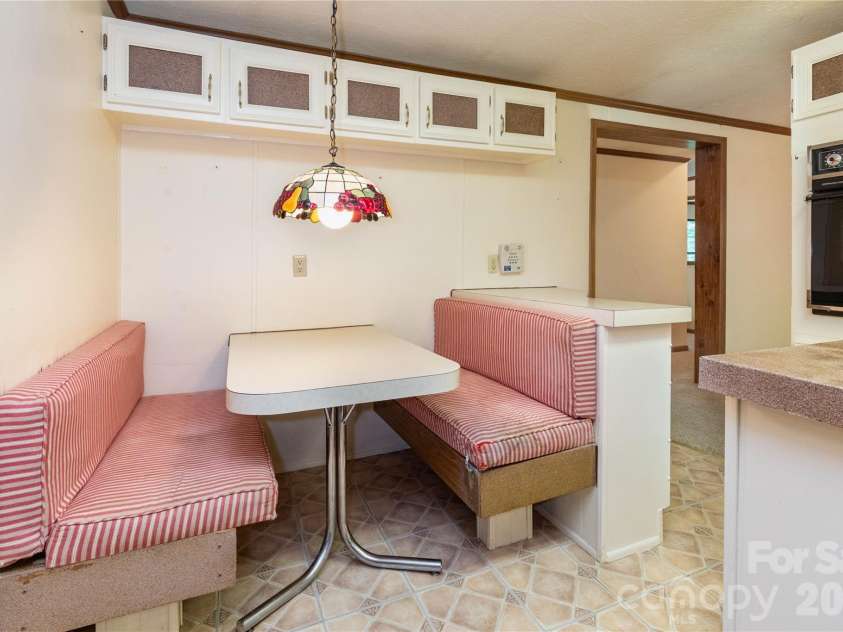 1010 Sharon Ridge Road, Fairview, NC 28730.  MLS# CAR4379788, YatesRealty ID 27153. Kitchen dining nook